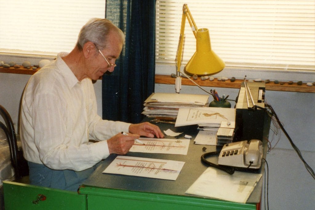 Järvelä is drawing at his board.
