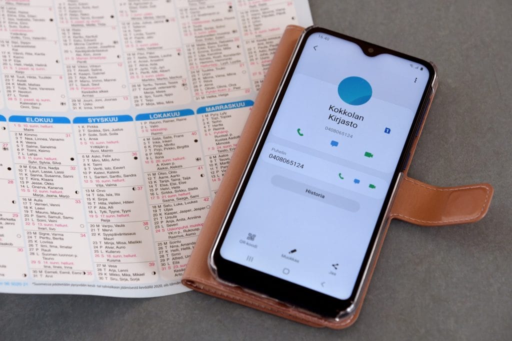 An almanac and smartphone.